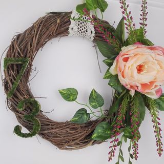 Door wreath with house number