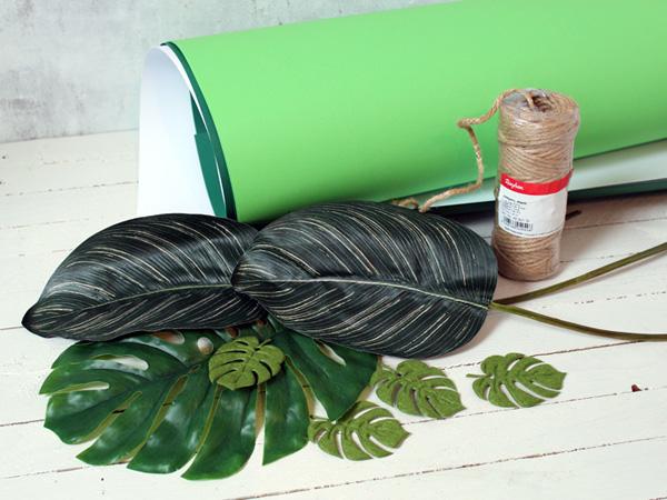Summer garland with Monstera leaves