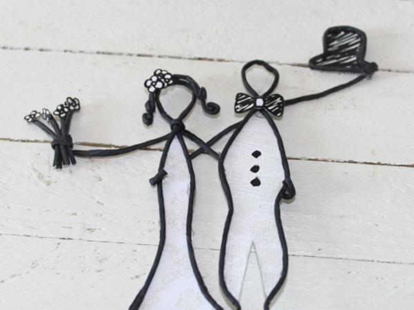 Glue both figures, man and woman, together